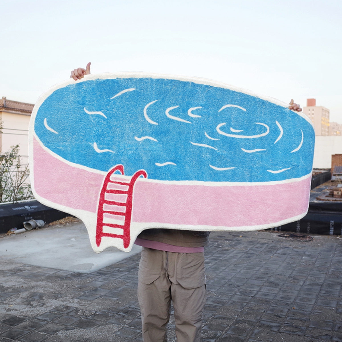 Inflatable pool in summer rug